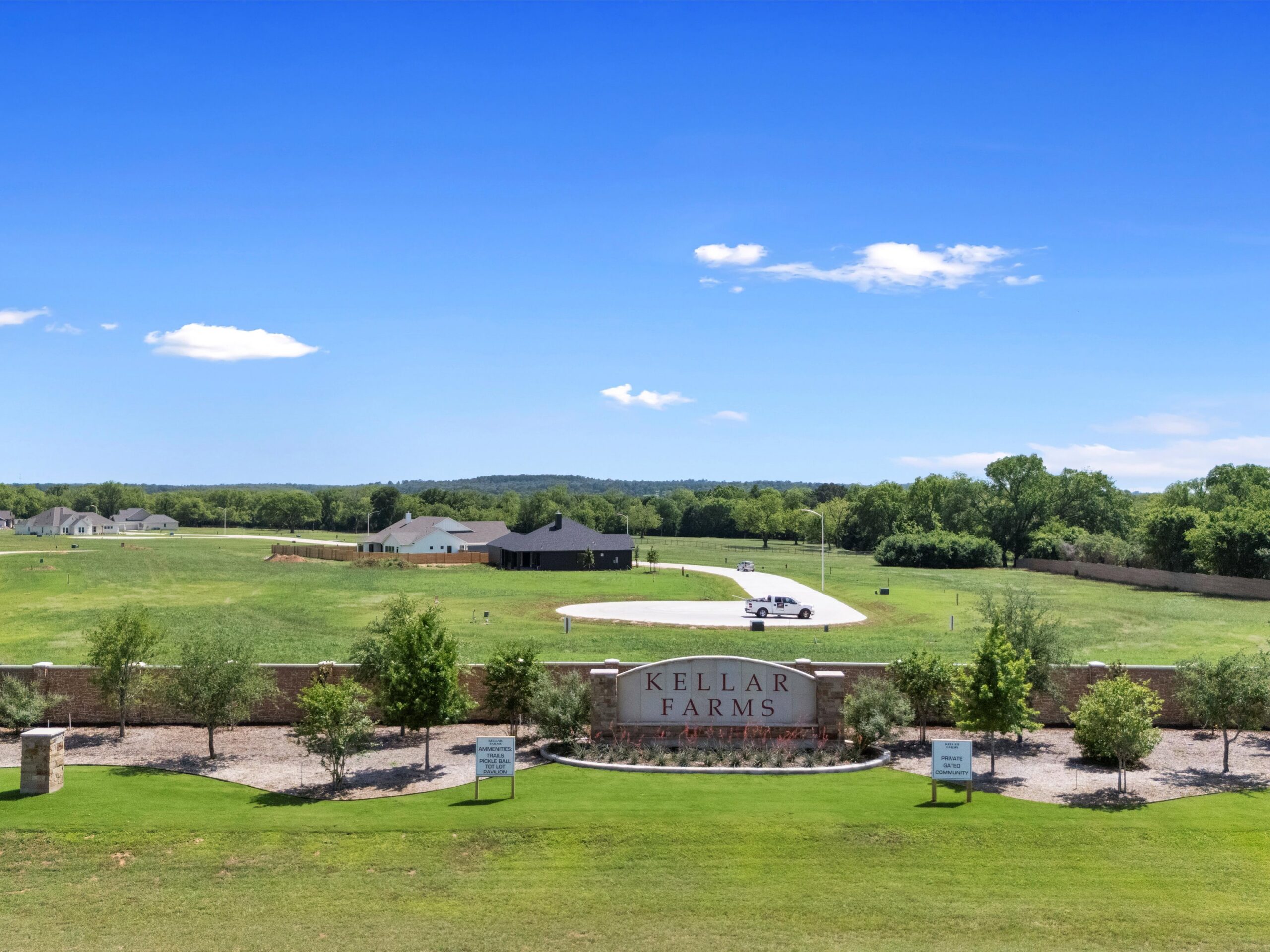 Kellar Farms stone entrance sign and gated community in Smithville, Texas